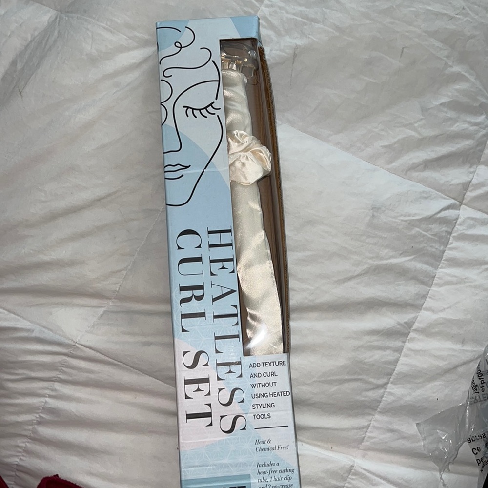 Heartless curl set- brand new never used